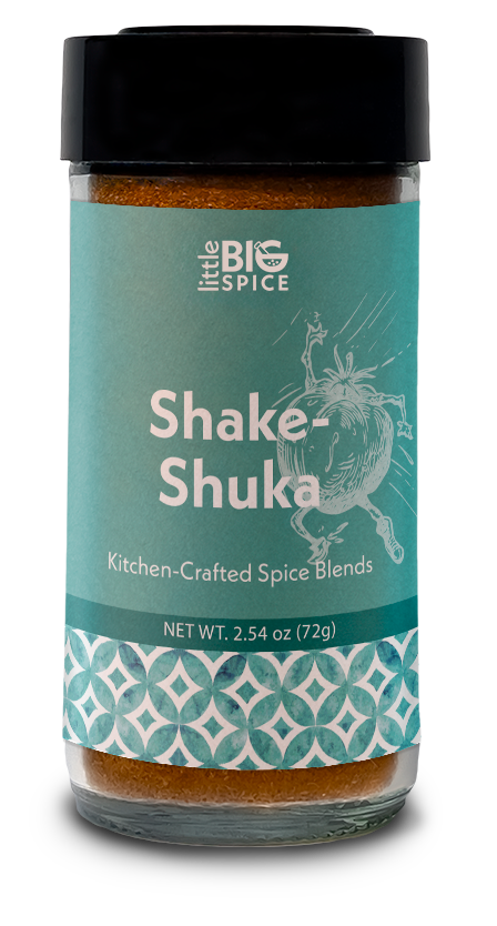 A bottle of Shake-Shuka spice blend for enhancing the flavors of tomato sauce in shakshuka, with a mix of Mediterranean spices.
